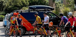 Cyclists getting ready to ride at the turn to Sa Colobra in Mallorca, Spain