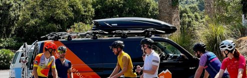 Cyclists getting ready to ride at the turn to Sa Colobra in Mallorca, Spain