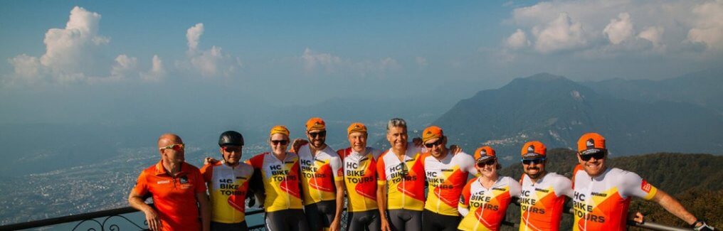 Group of cyclists from the USA at the top of Italy`s balcony on HC Bike Tours private tour