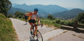 Artis Kalveits cycling finishing the Muro di Sormano climb in Italy near the lake Como
