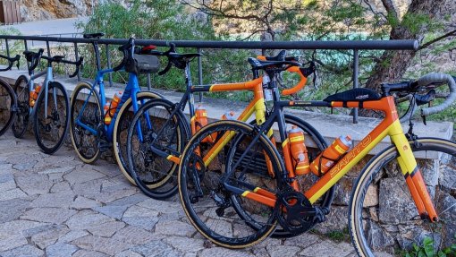 Sarto rental bikes and guests bikes parked outside Tunel Sa Colobra in Mallorca Spain