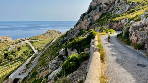 HC Bike Tours guest during private guided ride to Albercutx Watchtower (Talaia d'Albercutx) in Mallorca, Spain
