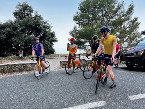 Group getting on the bikes to continue the ride after rest stop in Mallorca