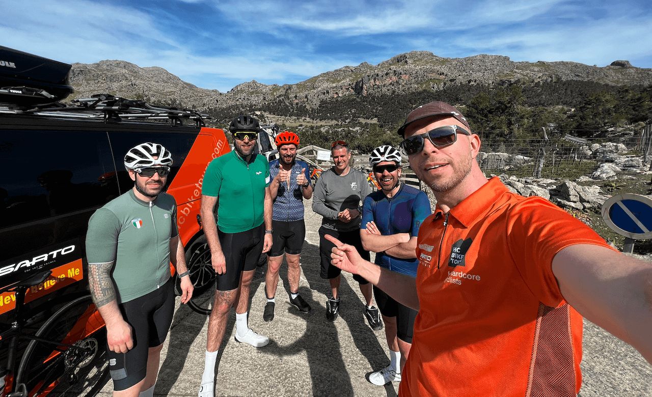 Cyclists enjoying a rest stop during SAG supported ride to Sa Colobra in Mallorca