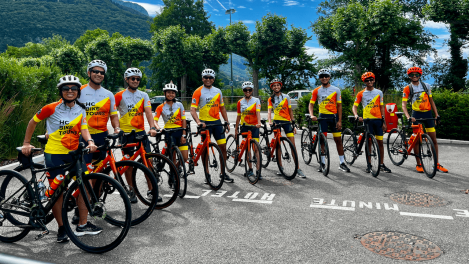 Cyclists getting ready to ride near lake Annecy in France during family bike trip from Annecy to Montreux