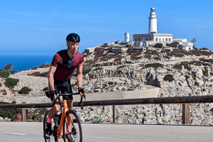 HC Bike Tours Mallorca Cycling Camp 2023 rider climbing during the return form Formentor lighthouse