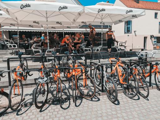 Cyclists enjoying a coffee stop curing Slovenia and Austria bike trip