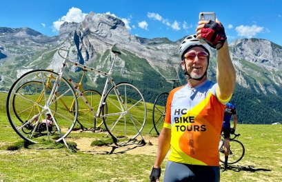 HC Bike Tours guest taking a selfie photo at the Col d'Aubisque during French Pyrenees bike trip in July 2023