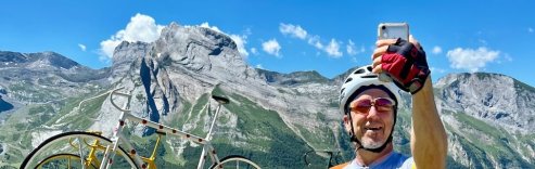 HC Bike Tours guest taking a selfie photo at the Col d'Aubisque during French Pyrenees bike trip in July 2023