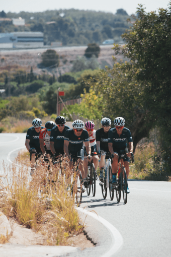 Cyclists riding in group during NGR PT cycling camp in Javea, Spain
