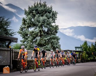 Cyclists riding a group during Lake Como bike trip in Italy