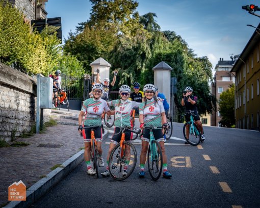 Friends posing for a picture during Lake Como bike trip in Italy