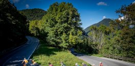 HC Bike Tours guests taking a hairpin turn during Lake Como bike trip in italy