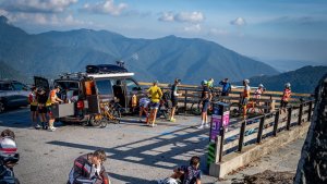 Cyclists enjoying a rest stop with a view during Lake Como bike trip in Italy