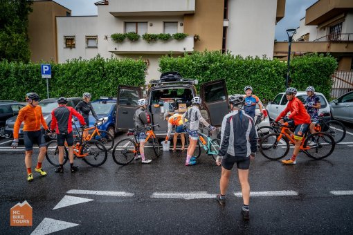 HC Bike Tours guests regrouping by the SAG support van during Lake Como bike trip in Italy
