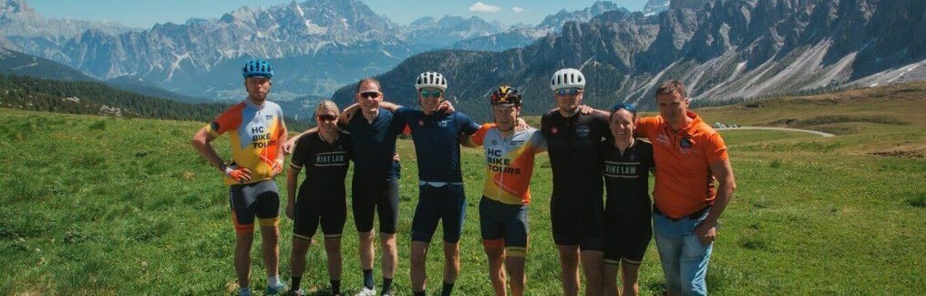 Group of cyclists in the Dolomites Italy | HC Bike Tours team with our guests from the USA