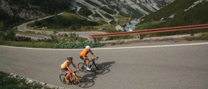 HC Bike Tours climbing by bike Passo Stelvio mountain in Italy